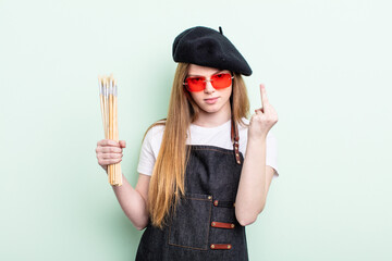 redhair woman feeling angry, annoyed, rebellious and aggressive. artist concept