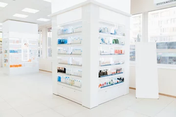 Foto op Canvas Empty drugstore chemist`s shop pharmacy without staff clients customers visitors with remedies, pills, medicines, goods, painkillers, jars on shelves © InsideCreativeHouse