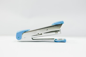 blue stapler isolated on white background