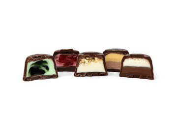 Collection of assortment of chocolate candies isolated on white background.
