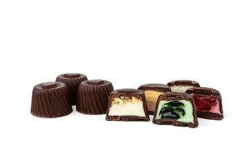 Collection of assortment of chocolate candies isolated on white background.