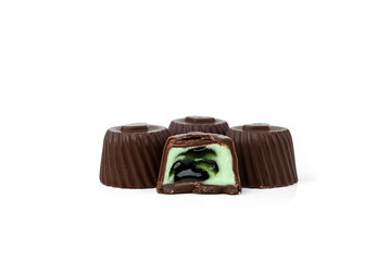Chocolate candies with apple filling isolated on white background.