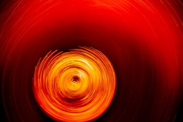 Long exposure concept background photo of bubbles in tea while spinning. The idea of  long exposure, space, time, planets, galaxies, black holes.