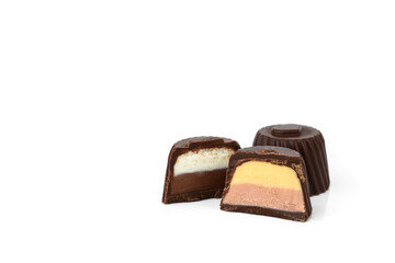 Double layer filled chocolate candies praline isolated on white background.