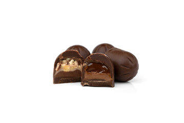 Chocolate candies with caramel isolated on white background.