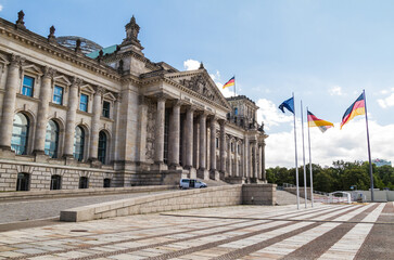 Obraz premium Reichstag Building historic edifice. Bundestag, German federal parliament on Platz der Republik in Berlin, Germany.