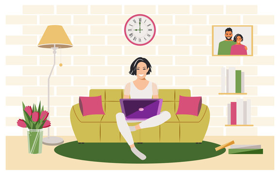 Happy woman sitting on a comfortable sofa working comfortably with a laptop during quarantine due to coronavirus. The modern concept of online education distance learning. 