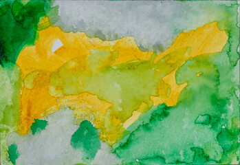 Watercolour paint. Colorful. Abstract background. Splashes. Green, yellow, gray, yellow colour. Aquarell paper. Hand painted.