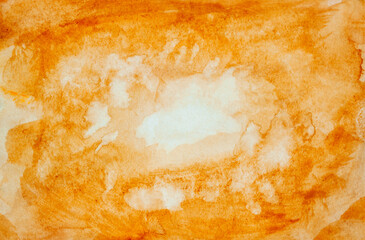 Watercolour colourful. Abstract background. Splashes. Orange, yellow. Aquarell paper. Hand painted. White centre