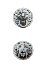 two plaster sculptures of a lion's head isolated on white background