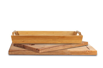 two wooden kitchen boards and a tray isolated on a white background