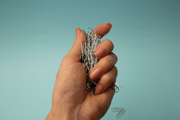 Stationery paper clips on background