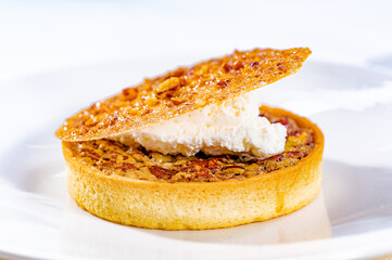 Pecan Pie Tart with Maple Lace Tuile and Whipped Cream