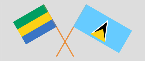 Crossed flags of Gabon and Saint Lucia. Official colors. Correct proportion