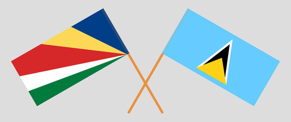 Crossed flags of Seychelles and Saint Lucia. Official colors. Correct proportion