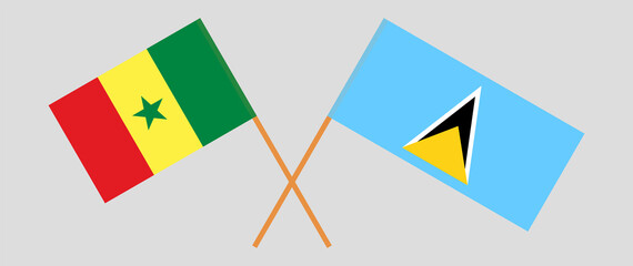 Crossed flags of Senegal and Saint Lucia. Official colors. Correct proportion