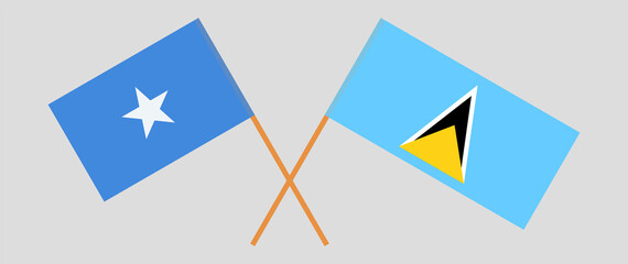 Crossed flags of Saint Lucia and Somalia. Official colors. Correct proportion
