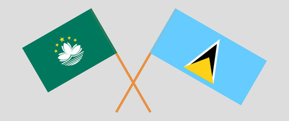 Crossed flags of Macau and Saint Lucia. Official colors. Correct proportion