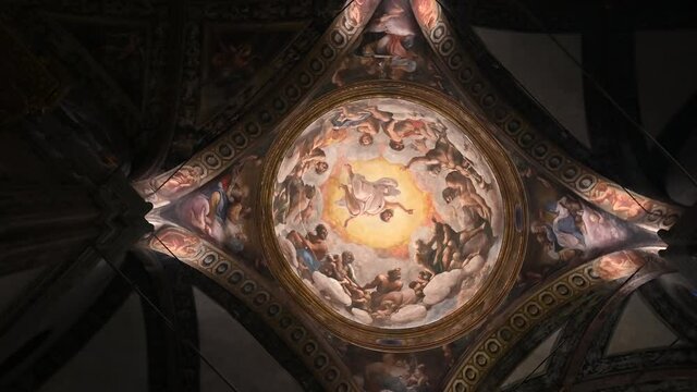 Parma, Emilia-Romagna, Italy. January 2022. Incredible footage inside the church of San Giovanni Evangelista. Rotation on the fresco of the dome: Jesus hovers over the apostles.
