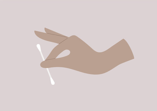 A hand holding a cotton swab, a daily hygiene routine concept