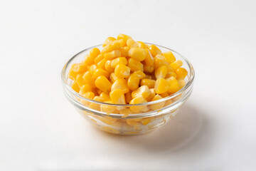 Sweet canned corn on a white background for insulation.