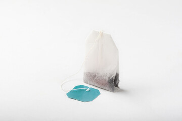 Tea bag on a white background. Tea bag close-up for insulation
