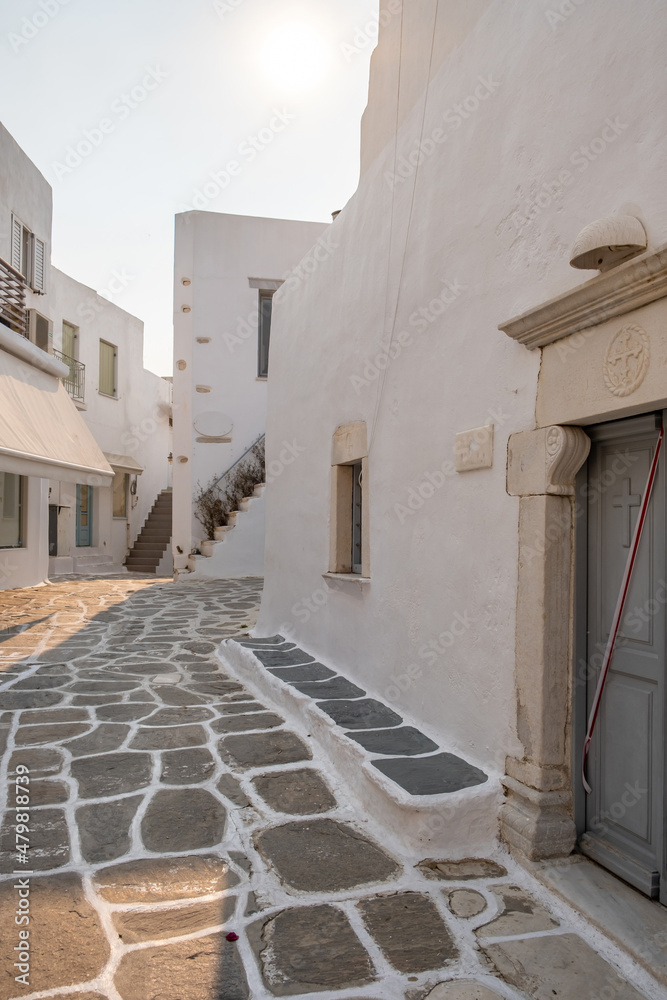 Canvas Prints paros island, greece. whitewashed building, empty narrow cobblestone street at naousa old town