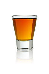 Small shot glass of whiskey. Isolated on a white background, close-up with reflection