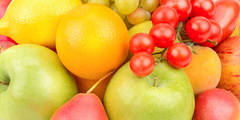 Beautiful background from various fruits and vegetables. Wide photo.