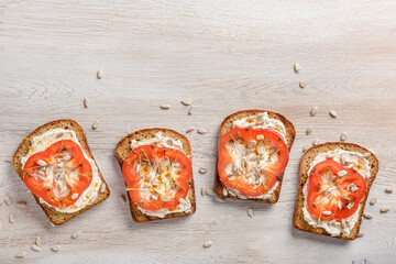 Toasts with cream cheese and vegetables