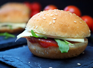 Burger with ketchup cheese and herbs