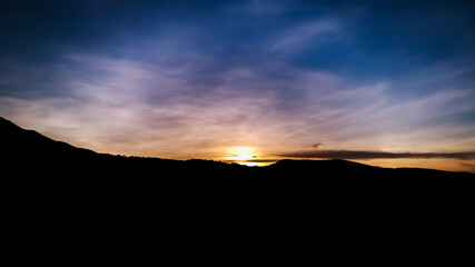 Obraz premium sunset over the mountains