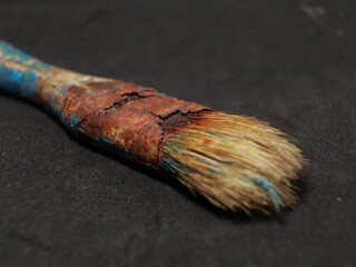 brush paint used condition with dirty brush and rusted brush holder
