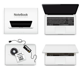 Fototapeta na wymiar New notebook computer and cardboard box top view