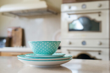 tableware on a blurred background of vintage kitchen interior - selective focus