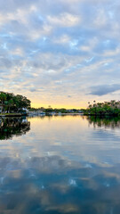 boat returning during sunset on the river