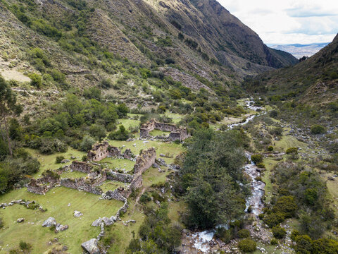 Aerial View Of Landscapes Of Chupani Village In Middle Of The Peruvian Andes. Small Community In The Sacred Valley With Some Ruins And River.