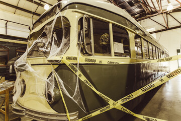 tram covered in web on Halloween