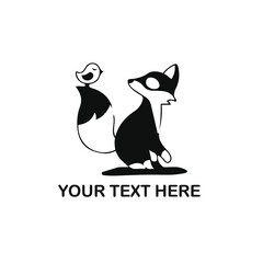 black and white fox with bird