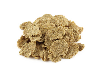 Pile of dry cereals isolated on white background. Brown cornflakes