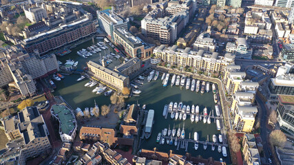 Aerial drone photo of iconic Saint Katherine dock Marina as seen at Christmas time, City of London,...