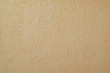 Textured art paper with flower pattern. 