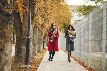 Elegant women in a autumn city