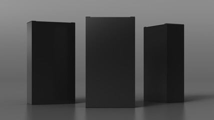 Gift box mock up: three flat, tall and wide black boxes on gray background. Front view.