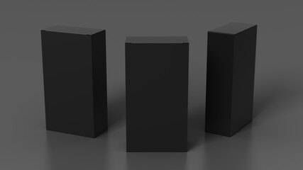 Gift box mock up: three flat, tall and wide black boxes on gray background. View above.