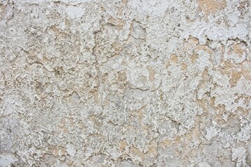 Obraz na płótnie Canvas Old concrete wall with peeling paint. Grunge background