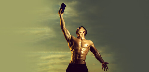 Fototapeta na wymiar Banner templates with muscular man, muscular torso, six pack abs muscle. Wet muscular man with water bottle. Muscle body of strong man.