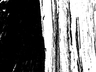 Grunge is black and white. Texture of black strokes on a white background. Abstract chaotic movements with a dry brush. Monochrome pattern of worn surface