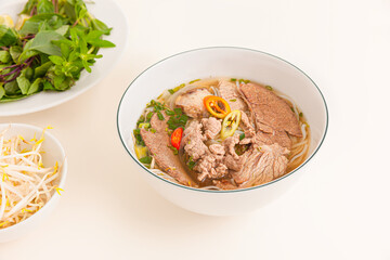 Pho, Vietnamese rice noodles soup, Vietnamese food isolated on white background,close-up