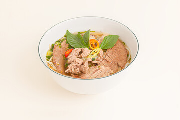 Pho, Vietnamese rice noodles soup, Vietnamese food isolated on white background, perspective view